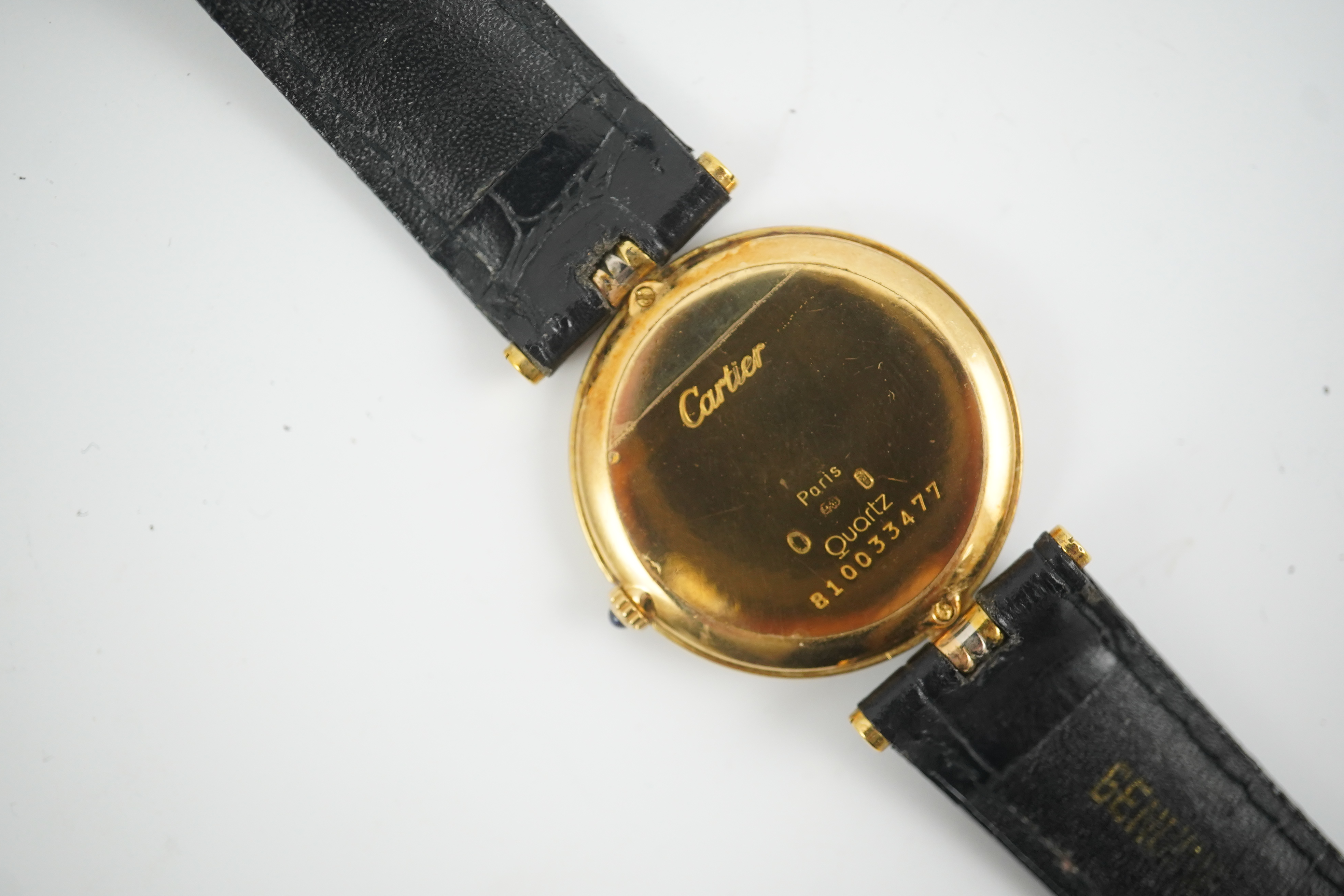 A modern 18ct gold Cartier Vendome quartz wrist watch, on an associated leather strap